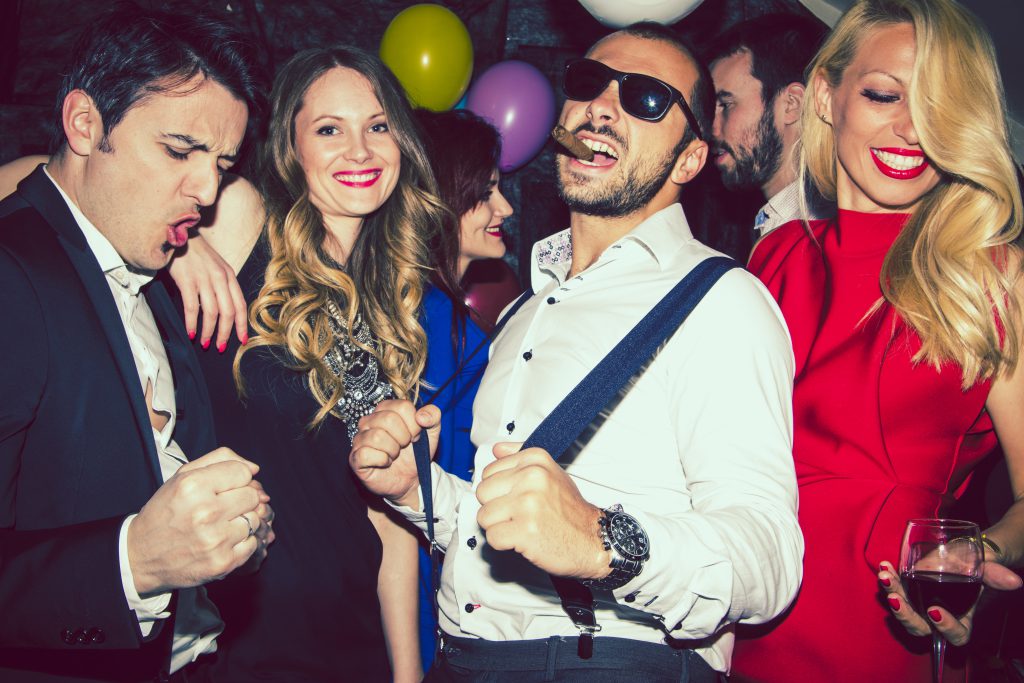 Group of friends having fun at a Krakow stag party night